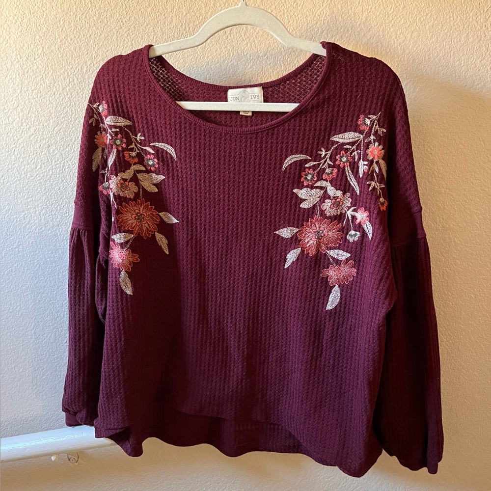 Francesca’s long sleeve embroidered sweater